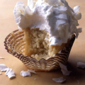 Coconut Cupcakes with Seven-Minute Frosting and Coconut Flakes