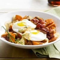 Sweet Potato Hash with Spicy Hollandaise on a Bed of Bacon