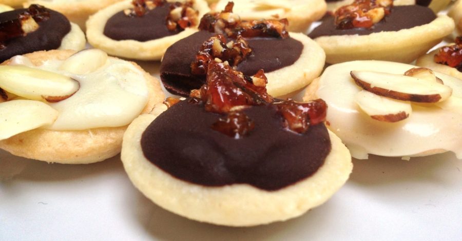 Mini Dark Chocolate and White Chocolate Ganache Tarts with Hazelnut Brittle and Almonds